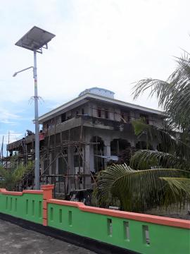 Solar panel in front of a mosque in Niela village 