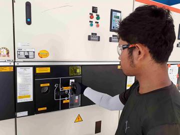 NZMATES Technical Specialist performing technical test at the diesel power plant in Tahalupu